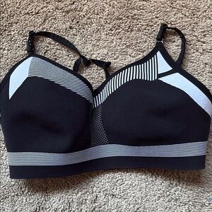 Black and White Sports Bra with Striped Design and Supportive Band
